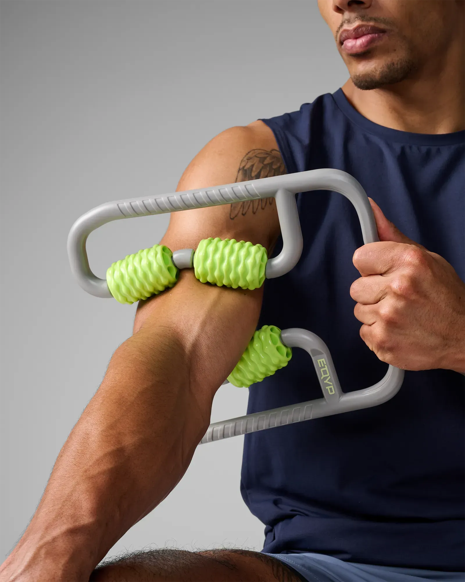 Man using flex muscle compressor on his arm
