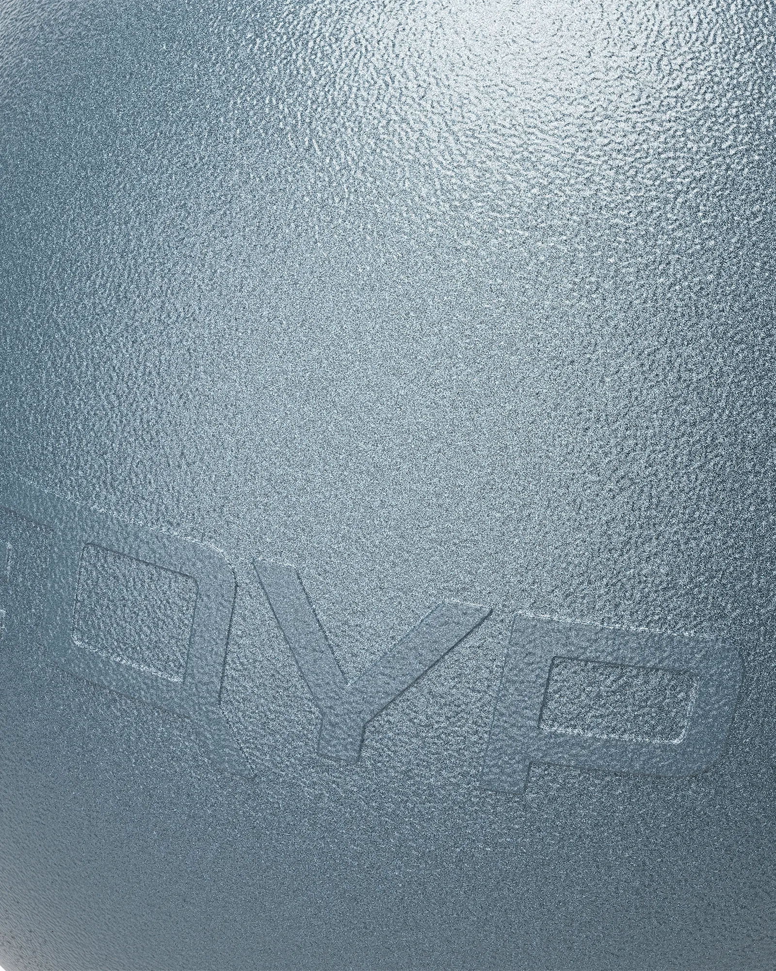 Close-up of EQYP Pro Stability Ball 65cm slate blue surface showing textured finish and embossed EQYP logo