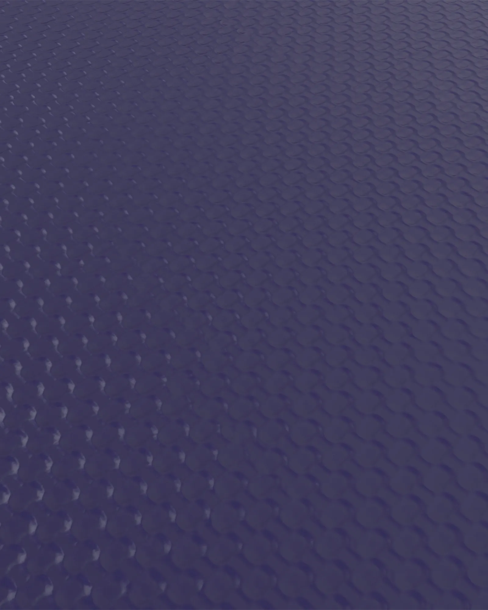 Close-up of EQYP Yoga Mat navy blue surface showing hexagonal non-slip texture pattern