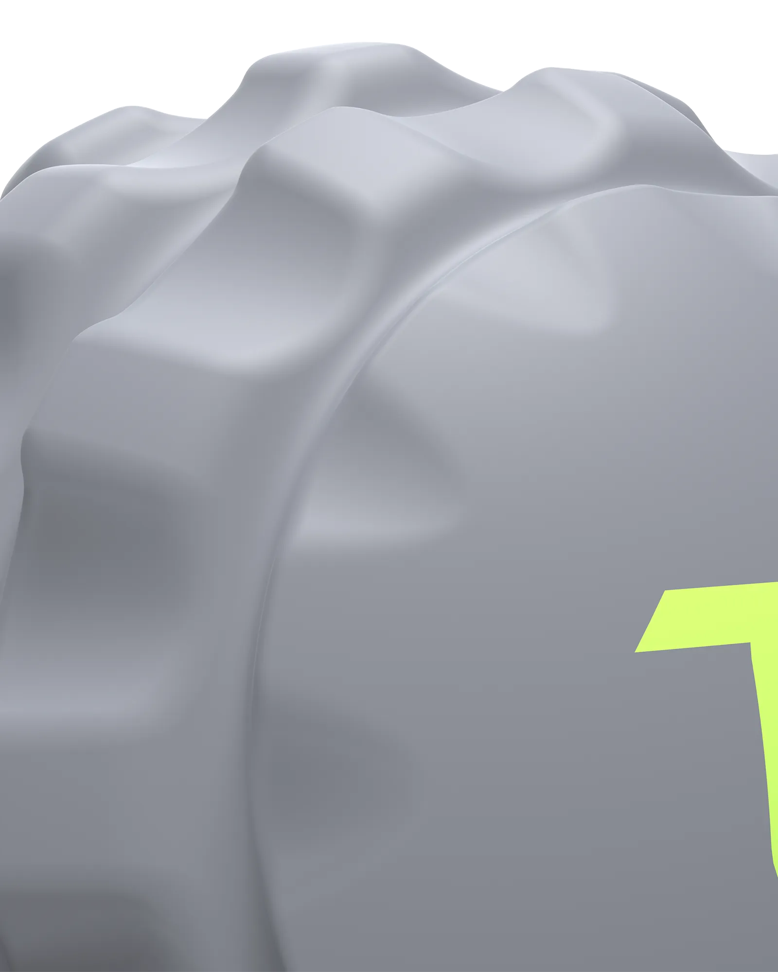 Close up of small sized gray EQYP massage ball for muscle recovery