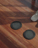 Video of Male and Female Athlete using Sliding Discs to perform different exercises on hardwood floor