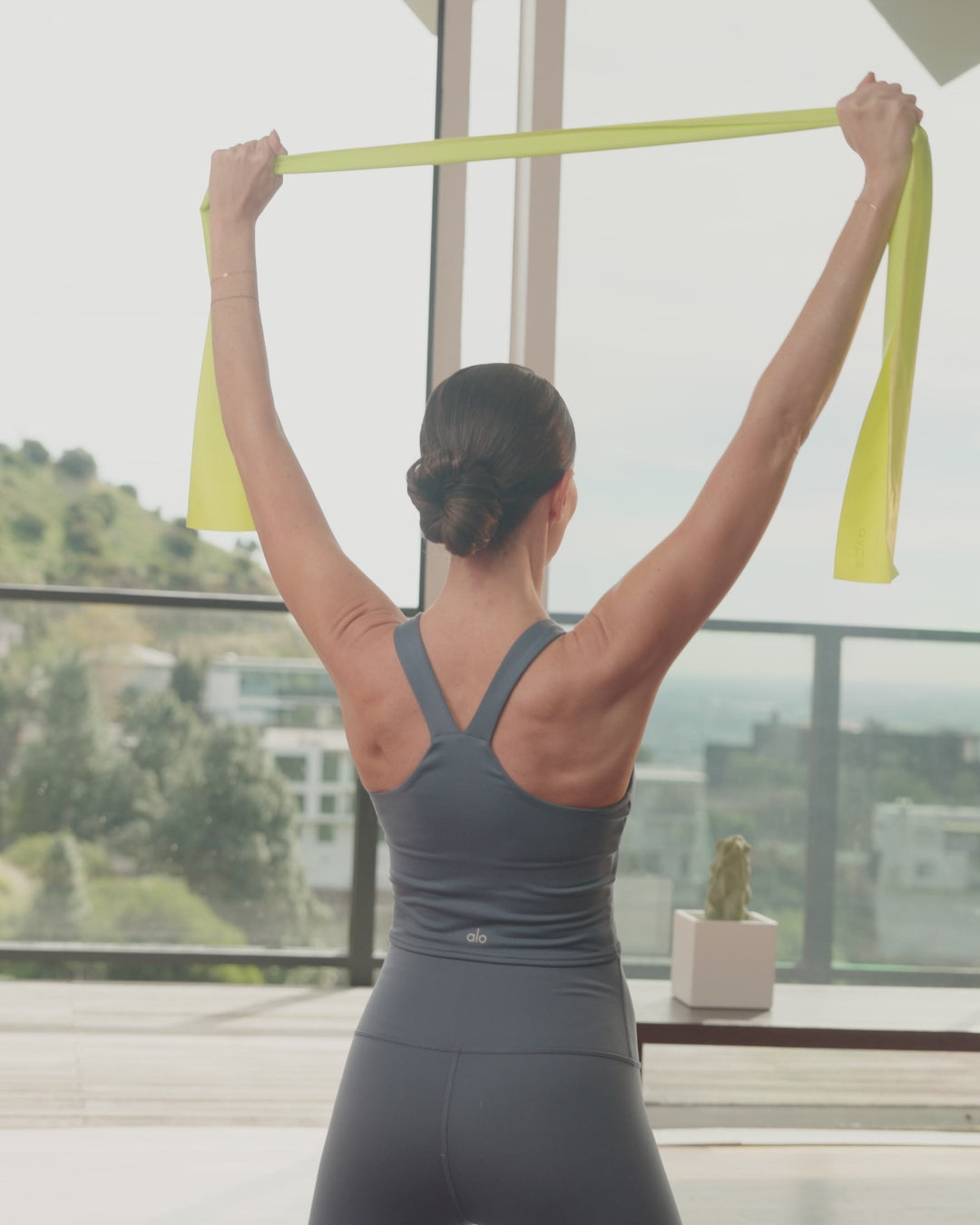 EQYP Flat Band 3-Pack demonstrating resistance levels and full range of motion
