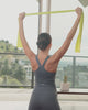EQYP Flat Band 3-Pack demonstrating resistance levels and full range of motion