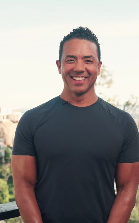 Terry, an EQYP trainer, smiling outdoors, representing the Train with Terry strength exercise series